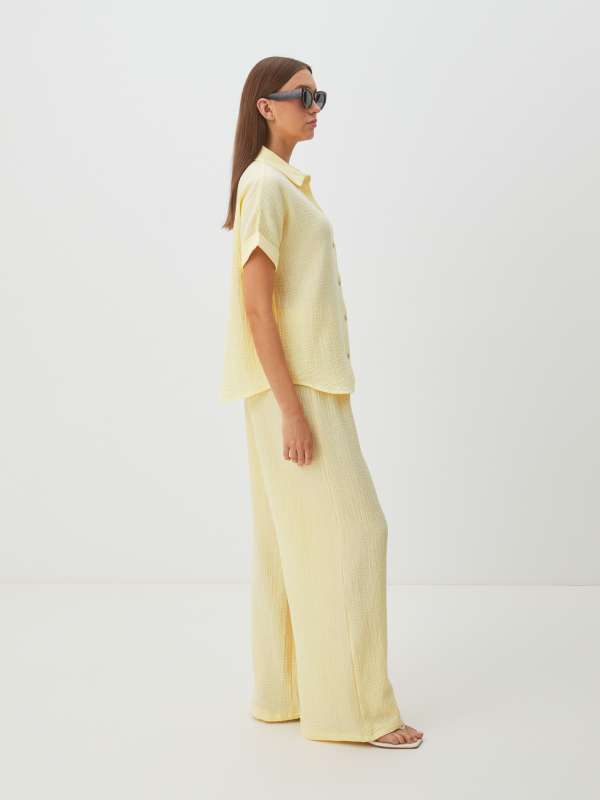 Женские широкие брюки из муслина BLN920/4235439, сливочный MAISON DAVID купить по оптовым и розничным ценам